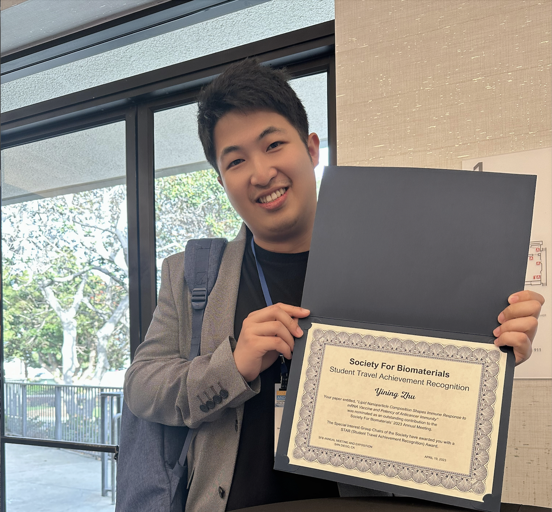 Yining receiving STAR award at SFB 2023